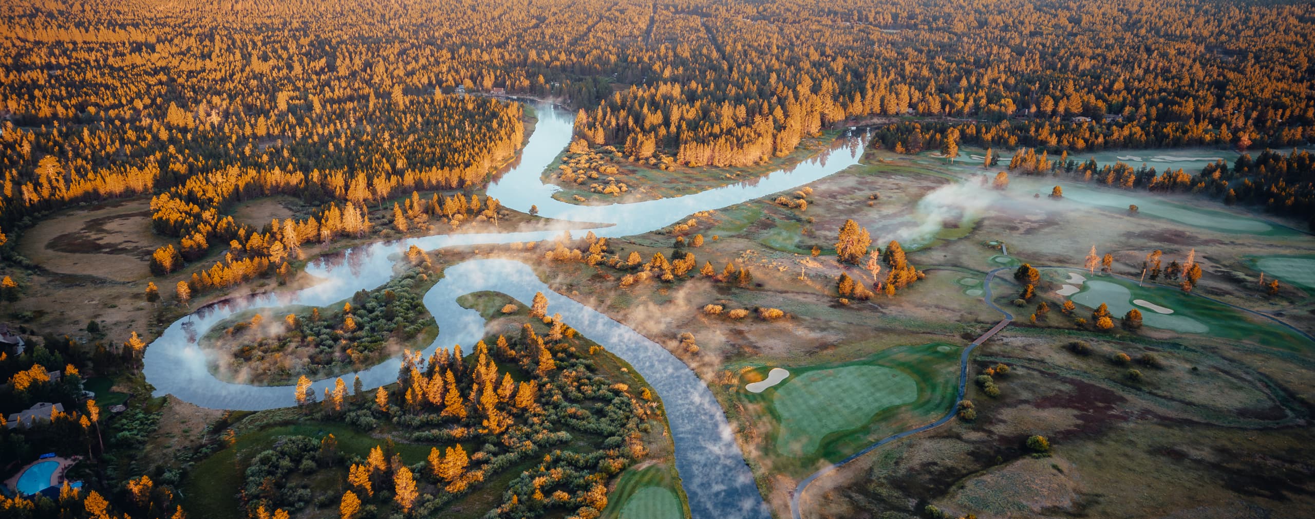 sunriver resort overview with forest in the background