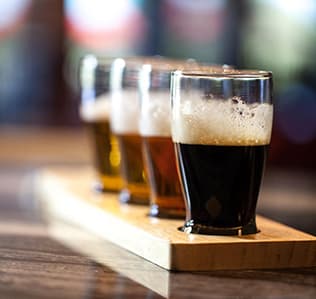Mini beer flight with the darker beers up front