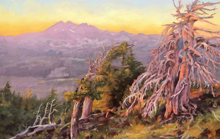 A vibrant landscape painting of twisted trees in the foreground, green hills, and distant purple mountains under a glowing yellow-orange sunset sky.