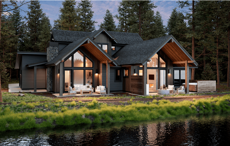 Modern cabin with large windows and covered patios sits by a calm forest lake, surrounded by tall pine trees and lush greenery, with outdoor seating areas visible through the glass.