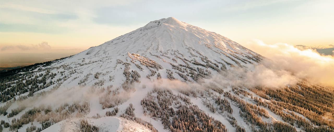 aerial view of Mt bachelor in the winter at sunrise